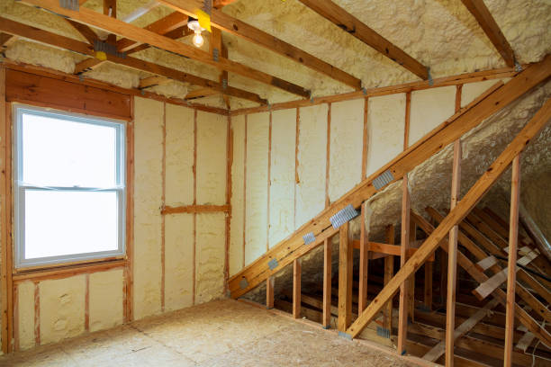 A room at a newly constructed home is sprayed with liquid insulating foam